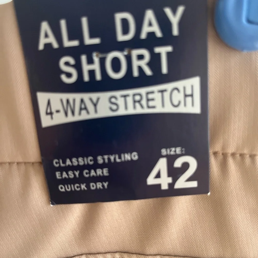 All Day Short Men’s NWT tan size 42 waist, 9” inseam.